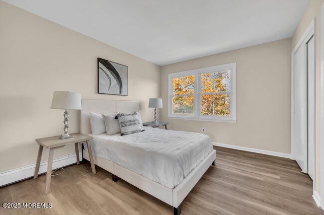 153 Cedar Swamp Road Jackson, NJ 08527 - Photo 12 of 21 a bedroom with a bed and a window