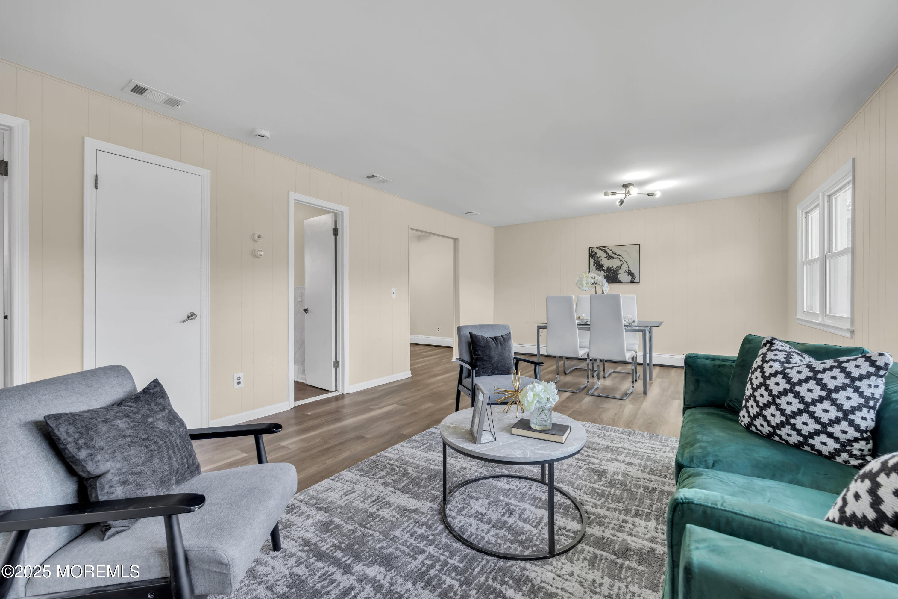 153 Cedar Swamp Road Jackson, NJ 08527 - Photo 15 of 21 a living room with furniture and wooden floor
