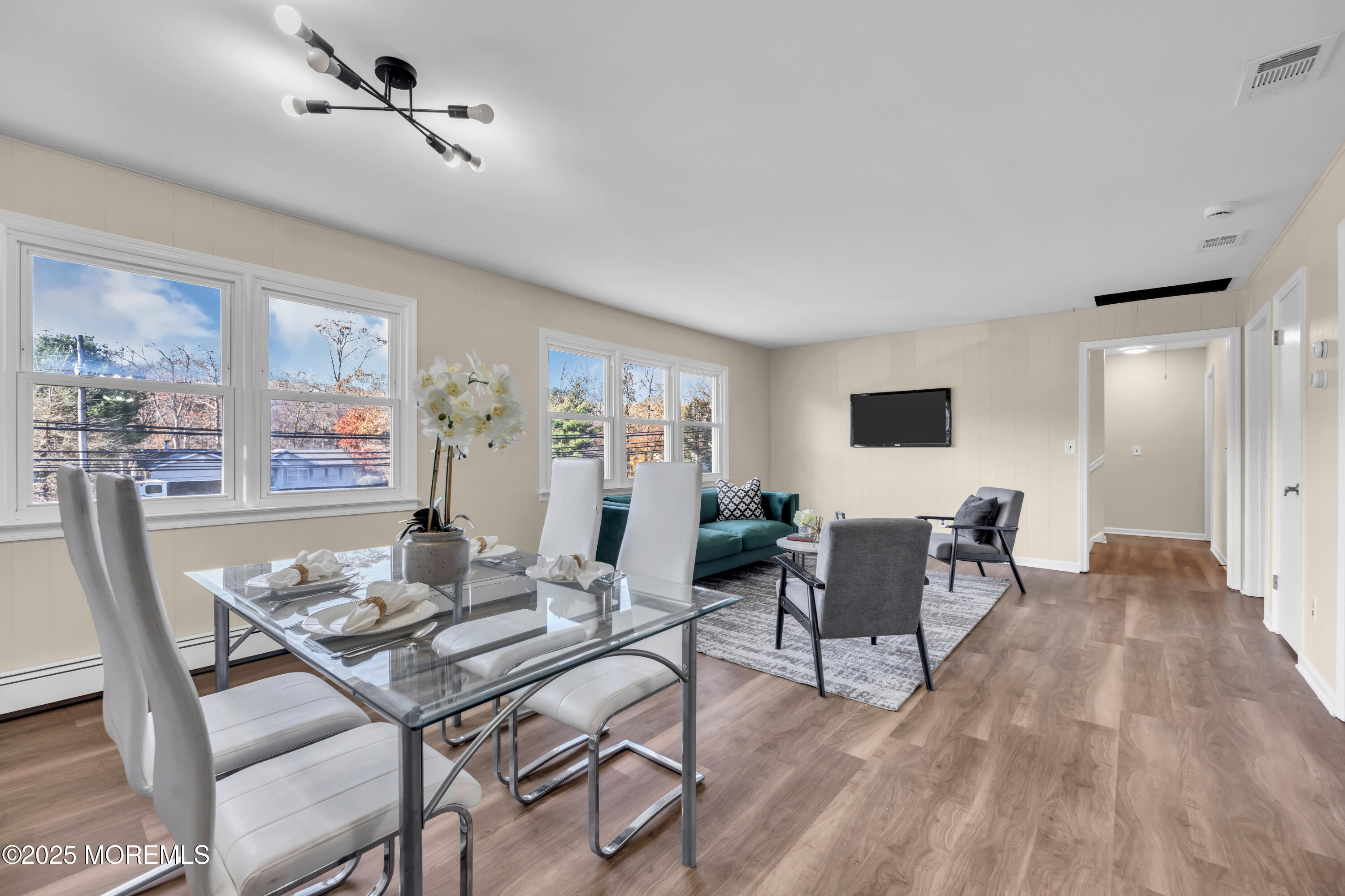 153 Cedar Swamp Road Jackson, NJ 08527 - Photo 16 of 21 a view of a dining room with furniture window and wooden floor
