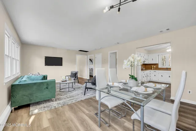 a living room with furniture and a table