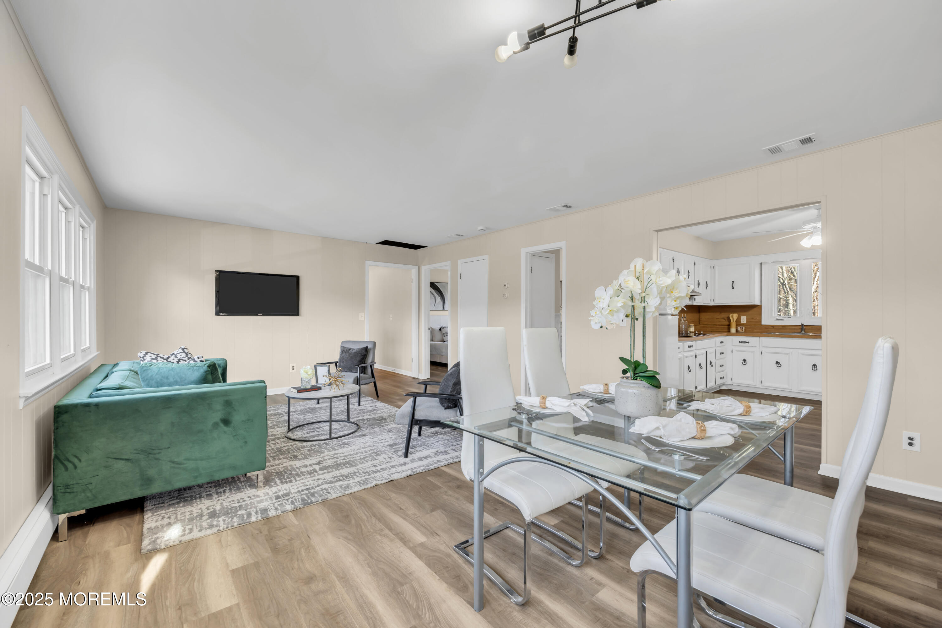 153 Cedar Swamp Road Jackson, NJ 08527 - Photo 17 of 21 a living room with furniture and a table