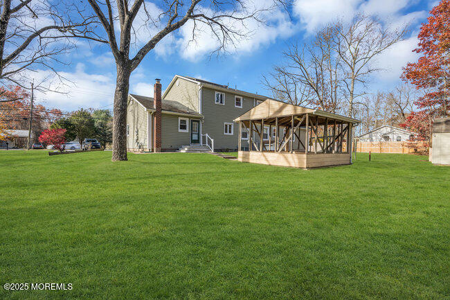 153 Cedar Swamp Road Jackson, NJ 08527 - Photo 18 of 21 a view of a house with a yard