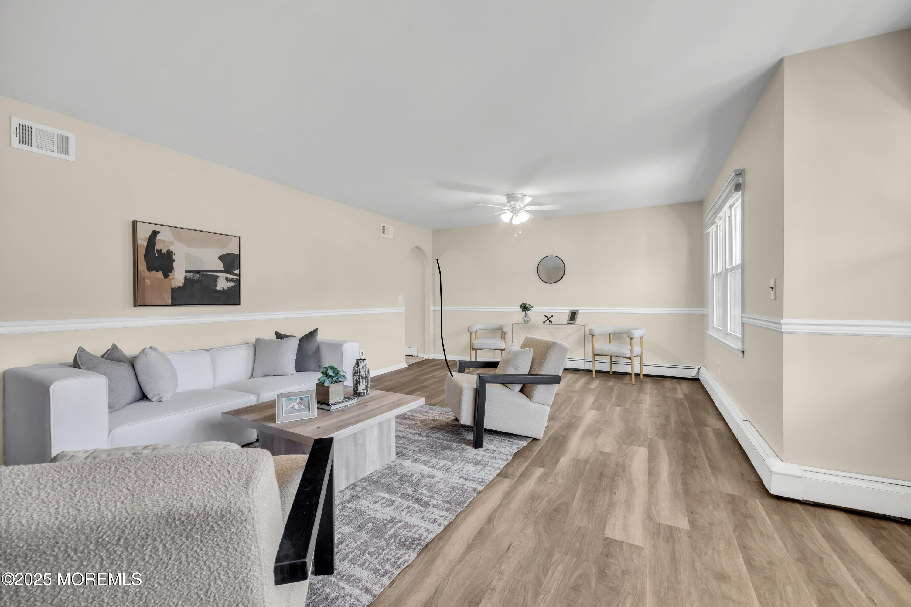 153 Cedar Swamp Road Jackson, NJ 08527 - Photo 5 of 21 a living room with furniture and wooden floor