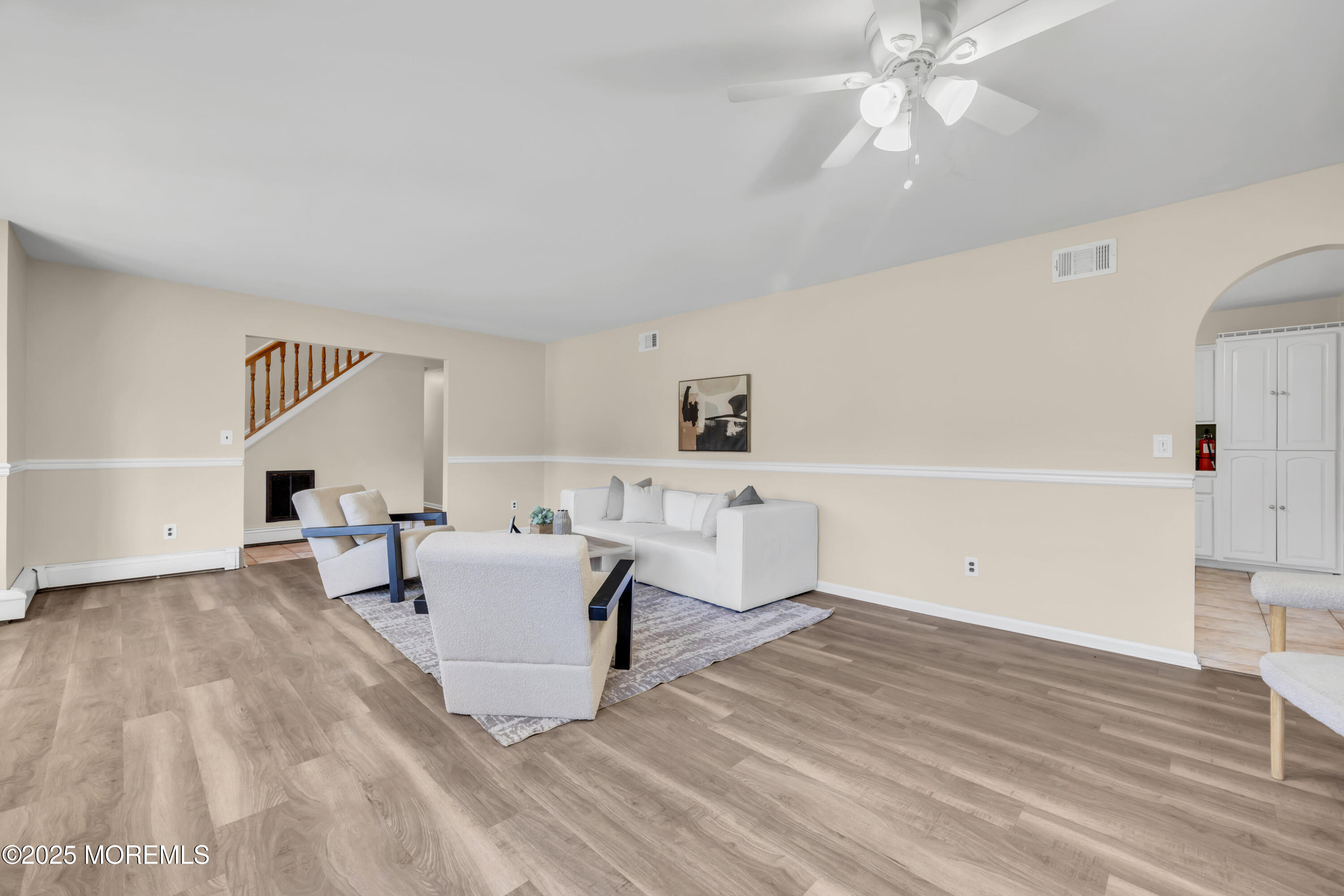 153 Cedar Swamp Road Jackson, NJ 08527 - Photo 6 of 21 a living room with furniture and a chandelier