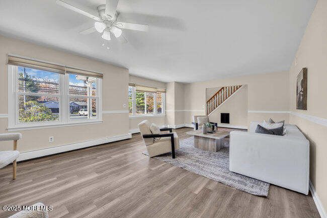 153 Cedar Swamp Road Jackson, NJ 08527 - Photo 7 of 21 a living room with furniture and a large window