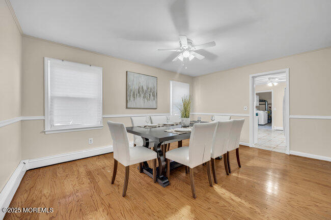 153 Cedar Swamp Road Jackson, NJ 08527 - Photo 8 of 21 a view of a dining room with furniture window and wooden floor