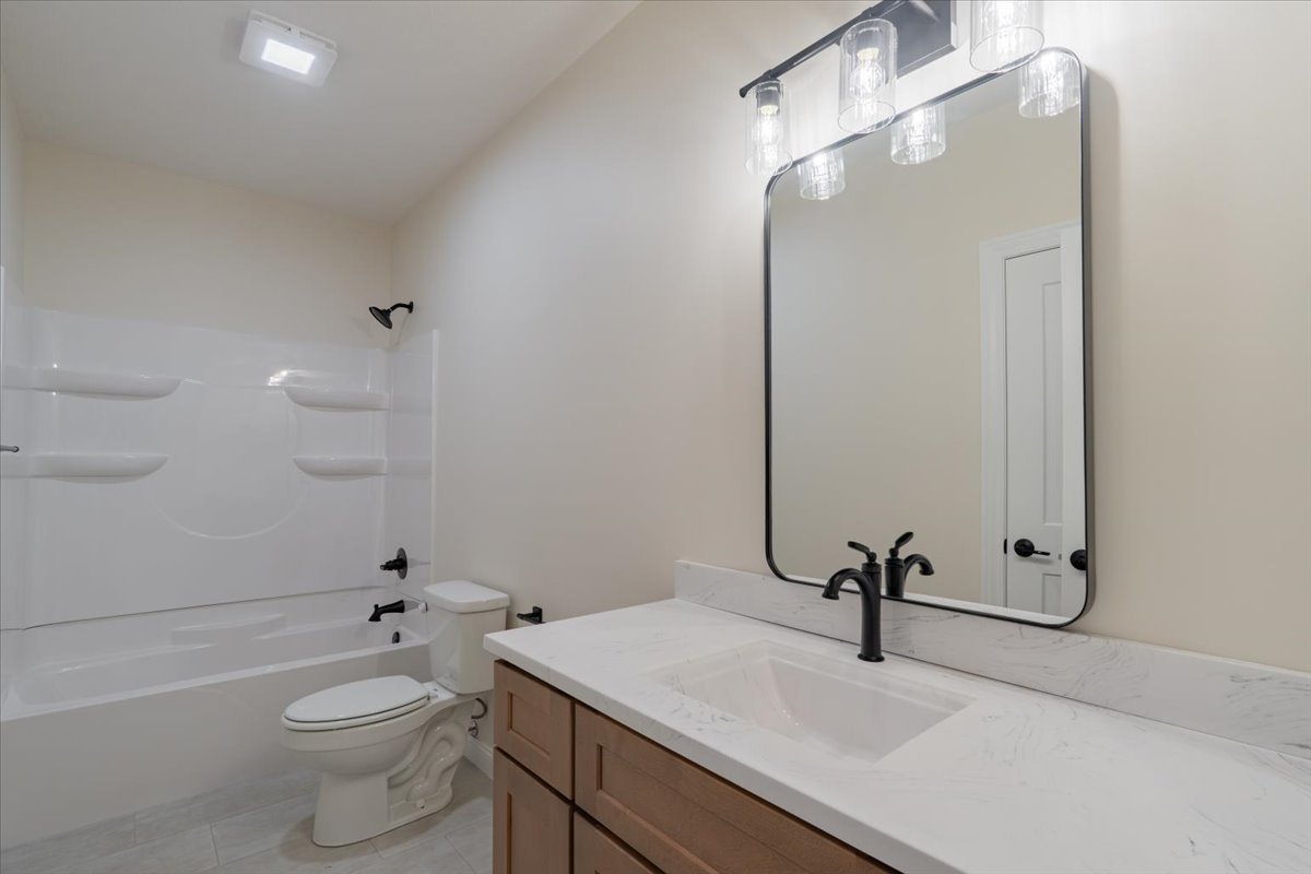 2538 Marble Road Normal, IL 61761 - Photo 23 of 27 a bathroom with a sink a toilet and shower
