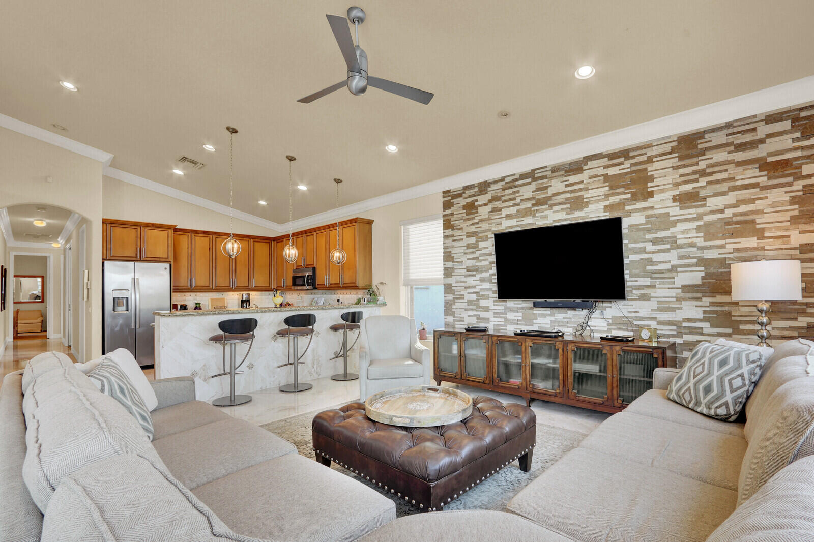 7349 Carmela Way Delray Beach, FL 33446 - Photo 17 of 82 a living room with furniture and a flat screen tv