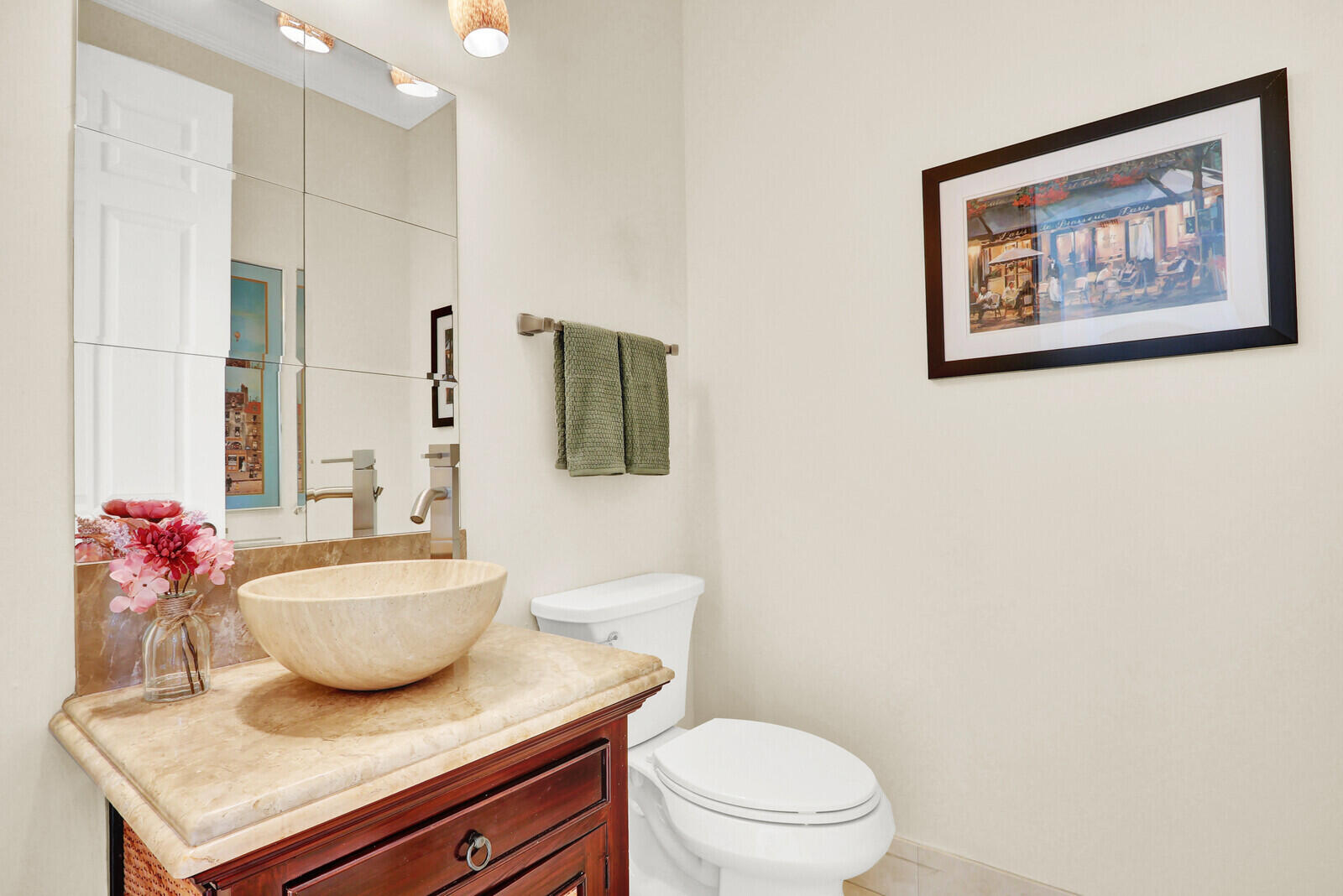 7349 Carmela Way Delray Beach, FL 33446 - Photo 23 of 82 a bathroom with a granite countertop sink a toilet and mirror
