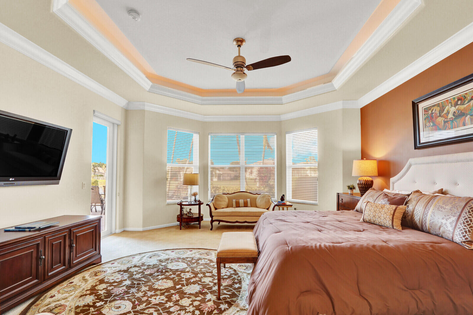 7349 Carmela Way Delray Beach, FL 33446 - Photo 24 of 82 a spacious bedroom with a large bed and a flat screen tv