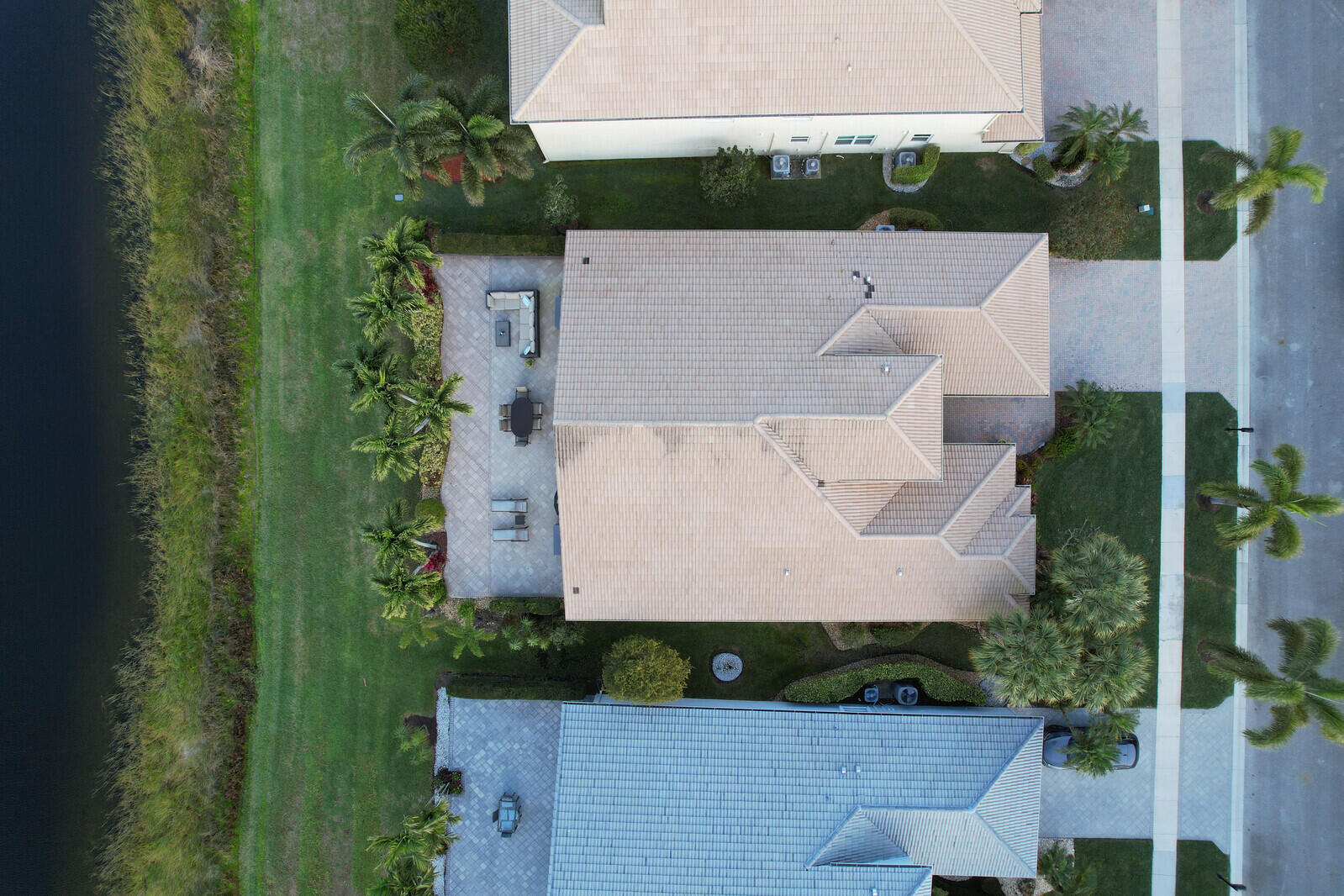 7349 Carmela Way Delray Beach, FL 33446 - Photo 48 of 82 an aerial view of a house with a yard