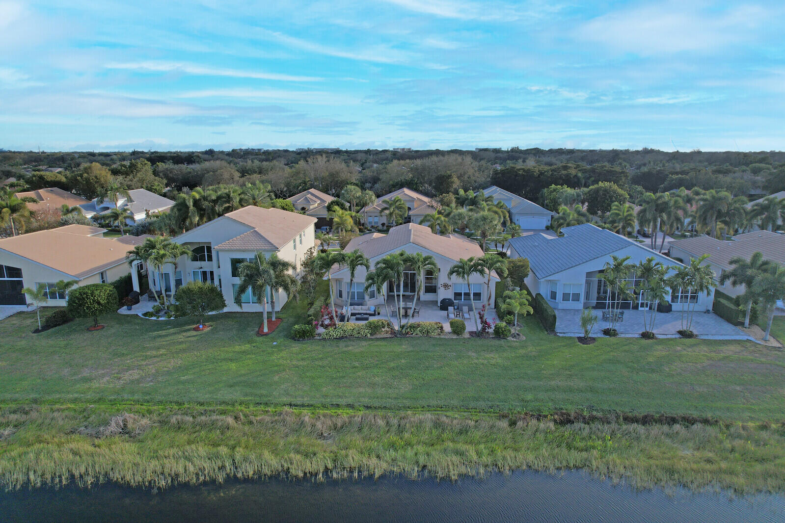 7349 Carmela Way Delray Beach, FL 33446 - Photo 52 of 82 an aerial view of residential houses with outdoor space