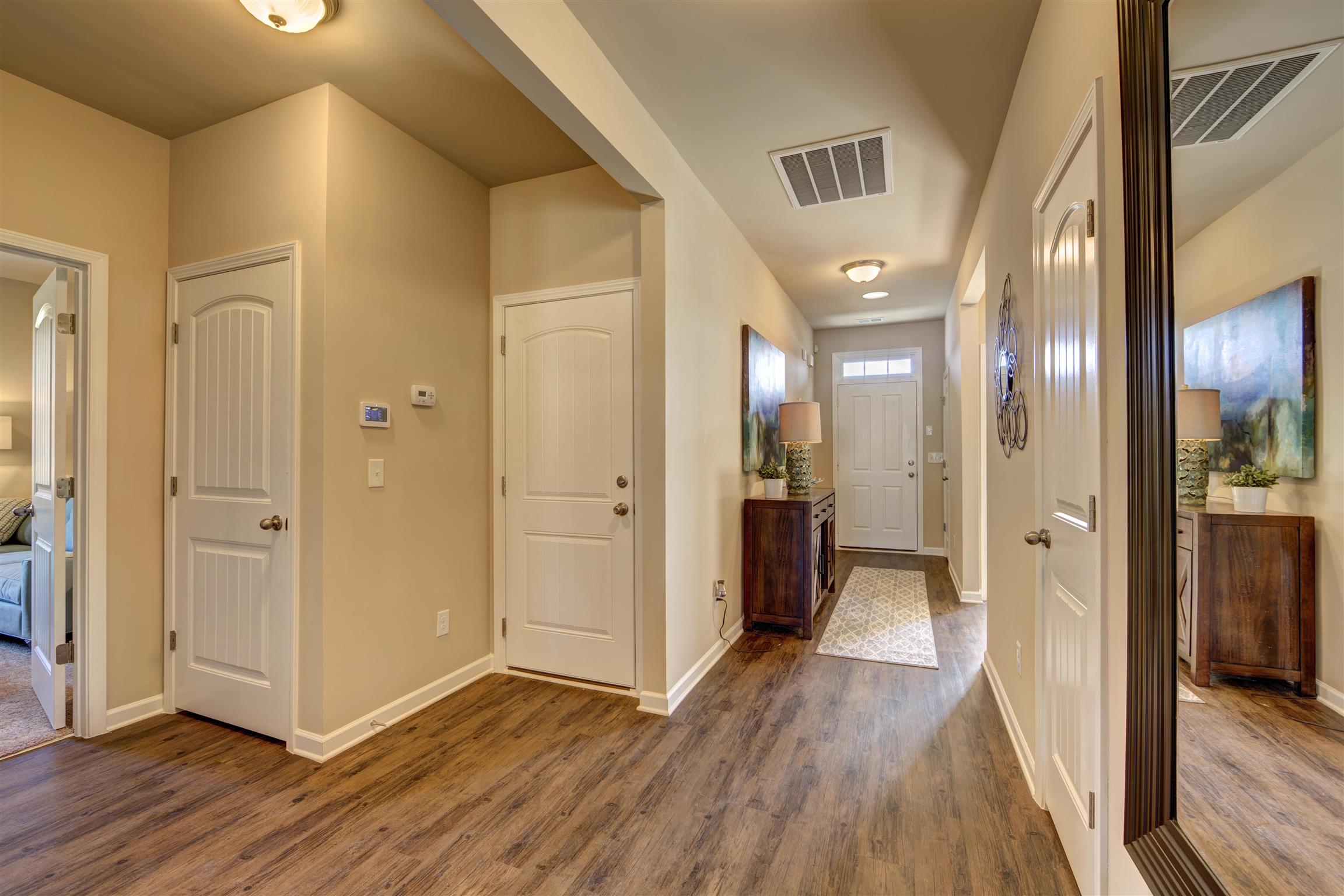 743 Prominence Road, Unit 97 Columbia, TN 38401 - Photo 4 of 23 a view of a hallway with wooden floor