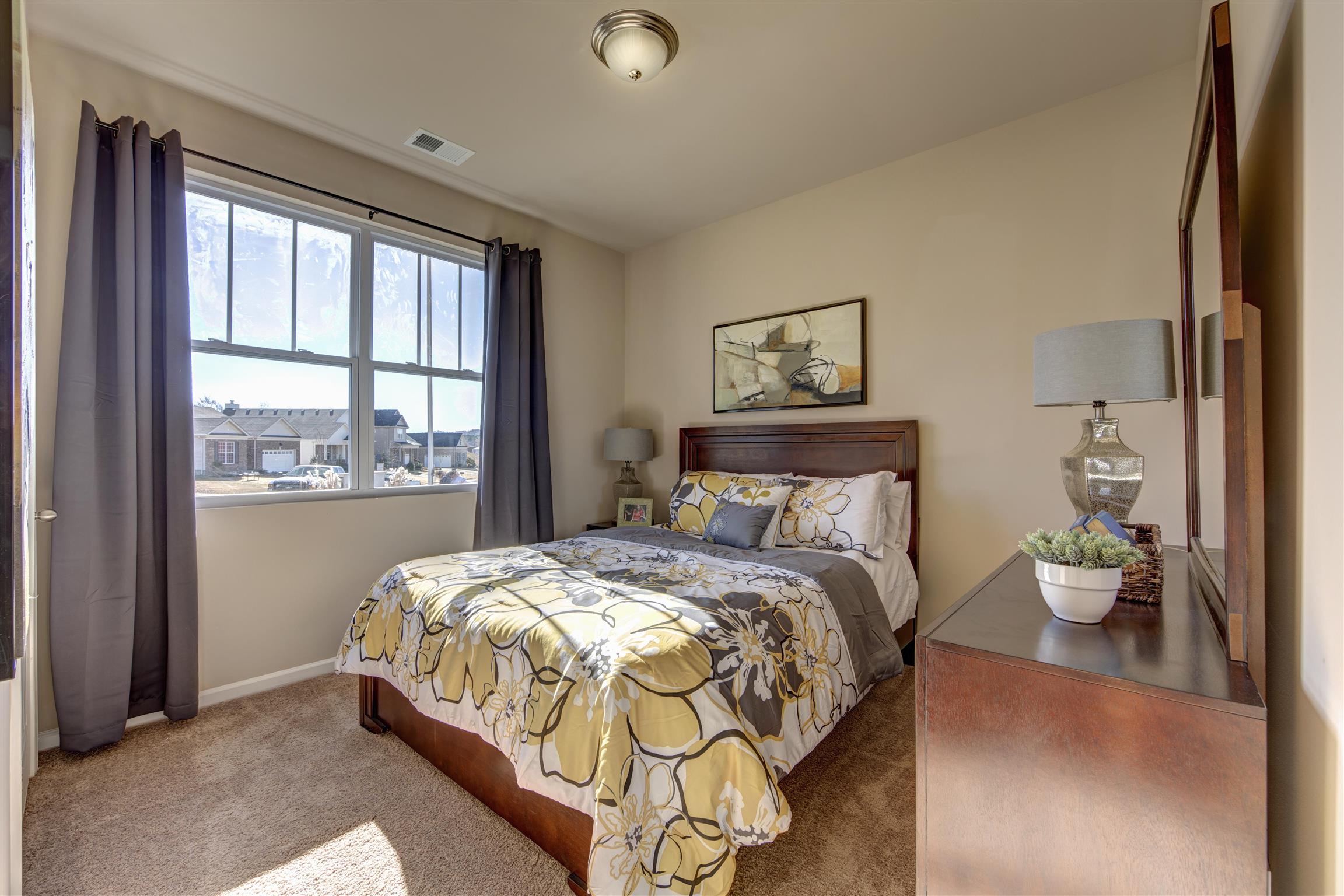743 Prominence Road, Unit 97 Columbia, TN 38401 - Photo 5 of 23 a bedroom with a bed and window