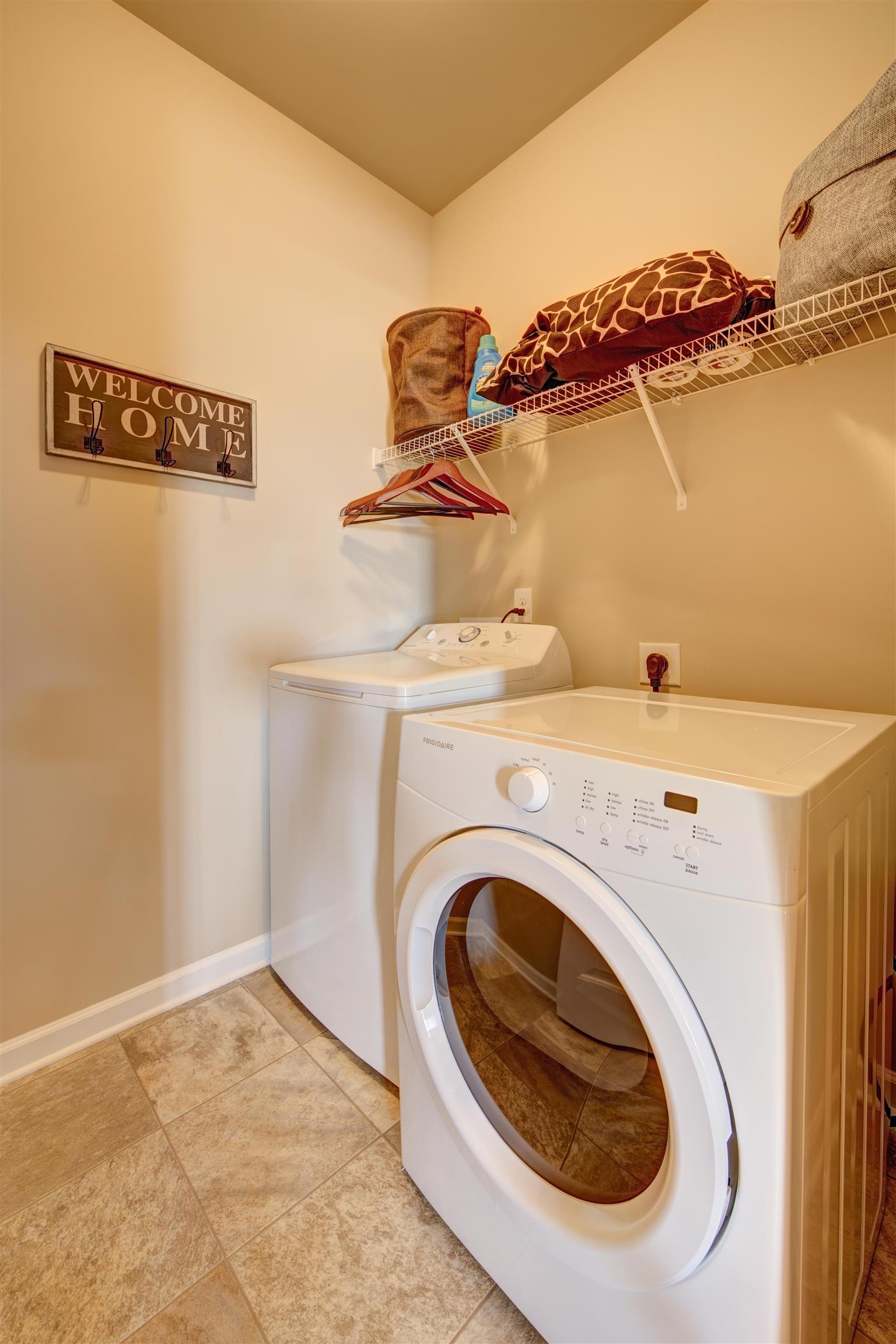 743 Prominence Road, Unit 97 Columbia, TN 38401 - Photo 9 of 23 a utility room with dryer and washer