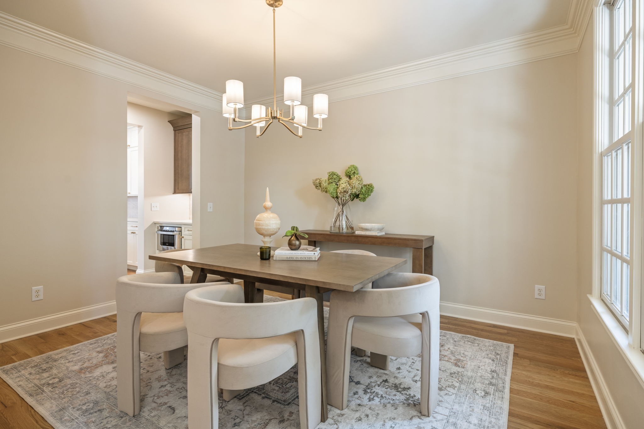 128 Addison Avenue Franklin, TN 37064 - Photo 14 of 81 a view of a dining room with furniture a chandelier and wooden floor