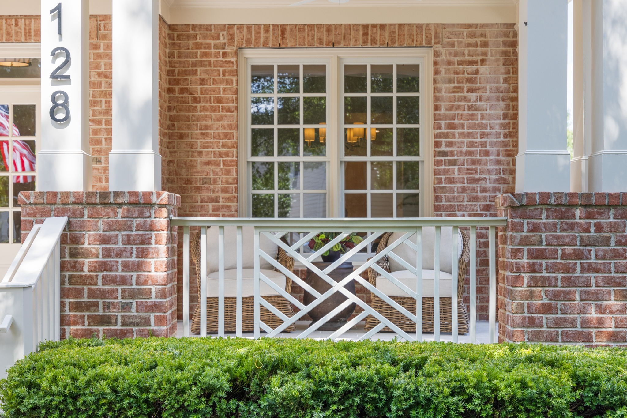 128 Addison Avenue Franklin, TN 37064 - Photo 3 of 81 a front view of a house with a yard and potted plants