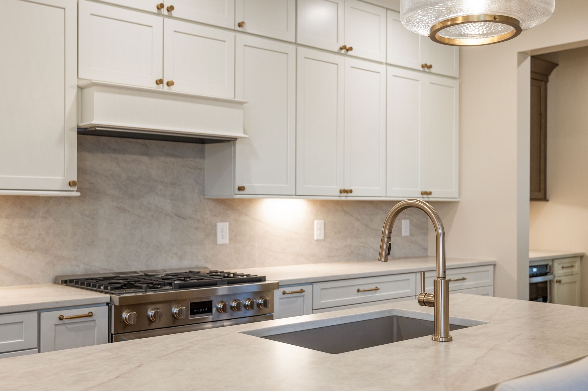 128 Addison Avenue Franklin, TN 37064 - Photo 32 of 81 a kitchen with granite countertop white cabinets and white appliances