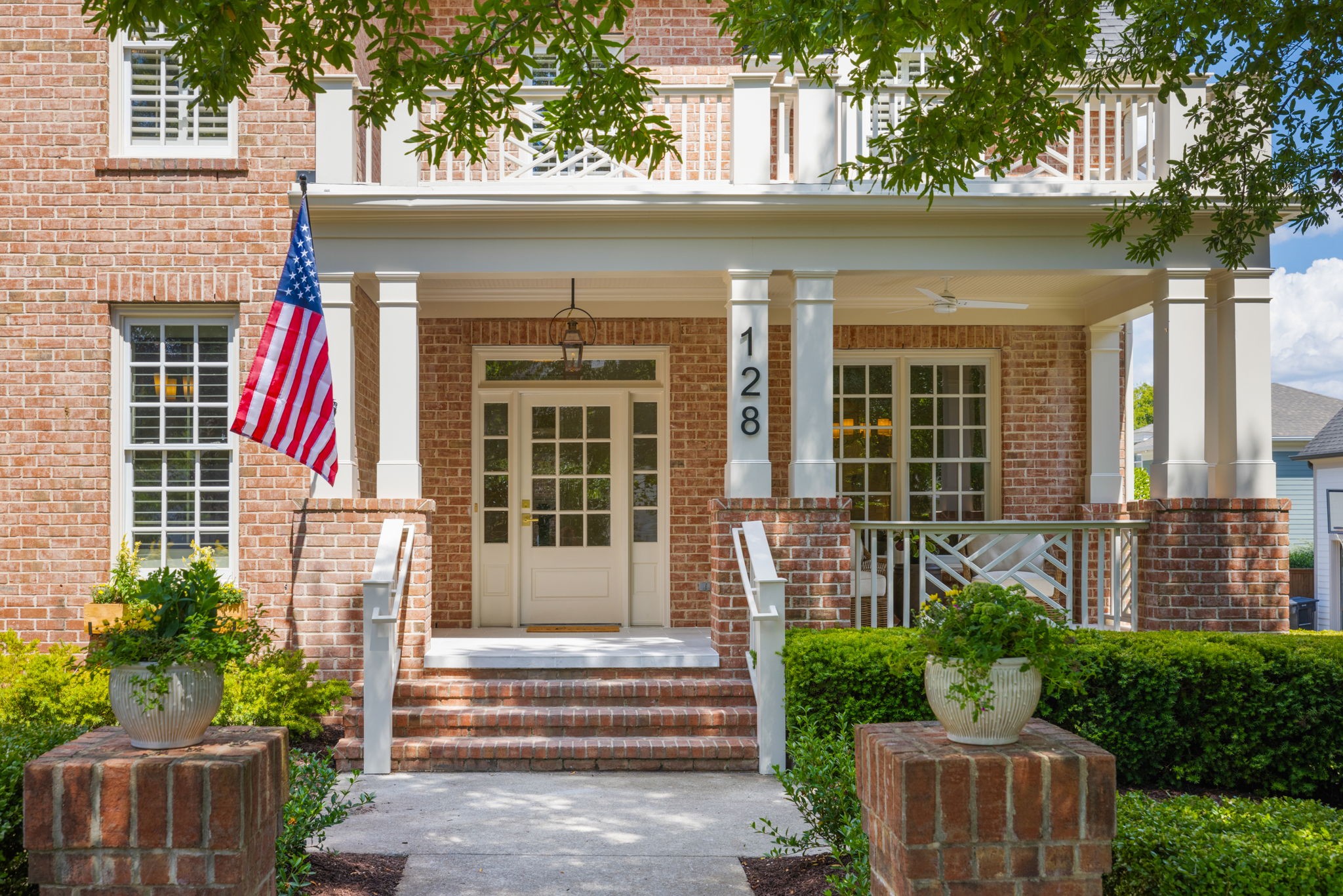 128 Addison Avenue Franklin, TN 37064 - Photo 4 of 81 a front view of a house with a porch