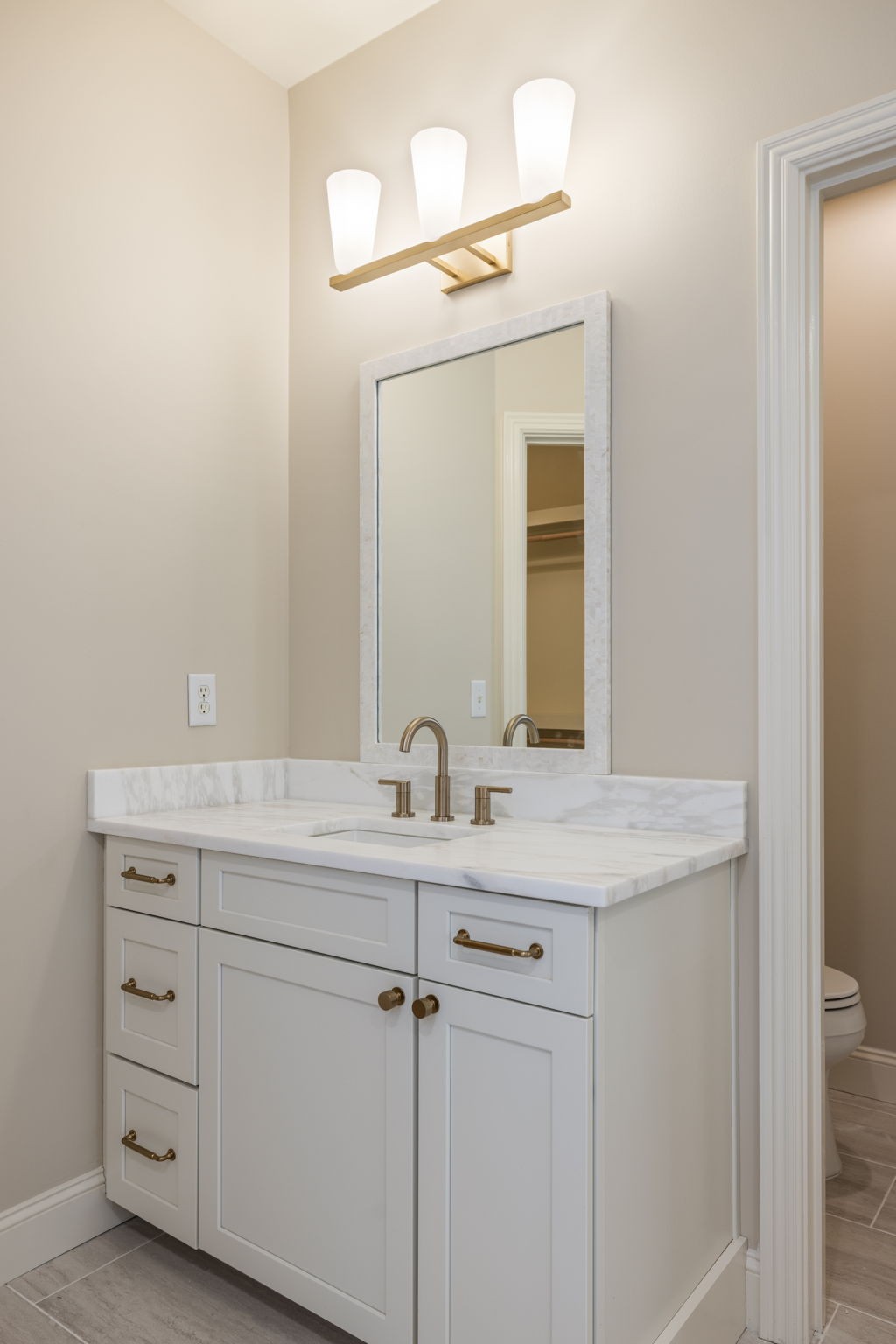 128 Addison Avenue Franklin, TN 37064 - Photo 45 of 81 a bathroom with a granite countertop sink and a mirror