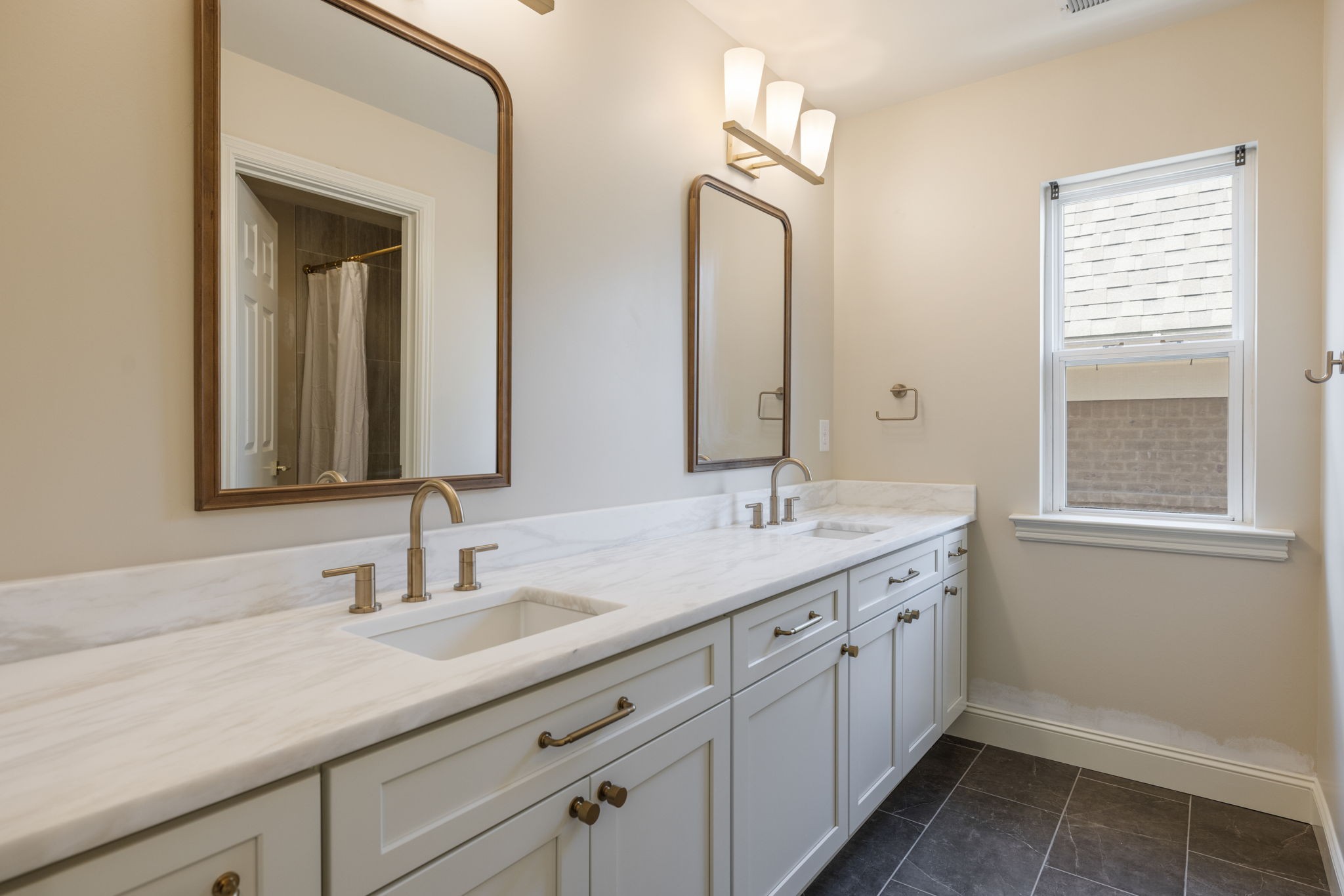 128 Addison Avenue Franklin, TN 37064 - Photo 54 of 81 a bathroom with double sink and a mirror