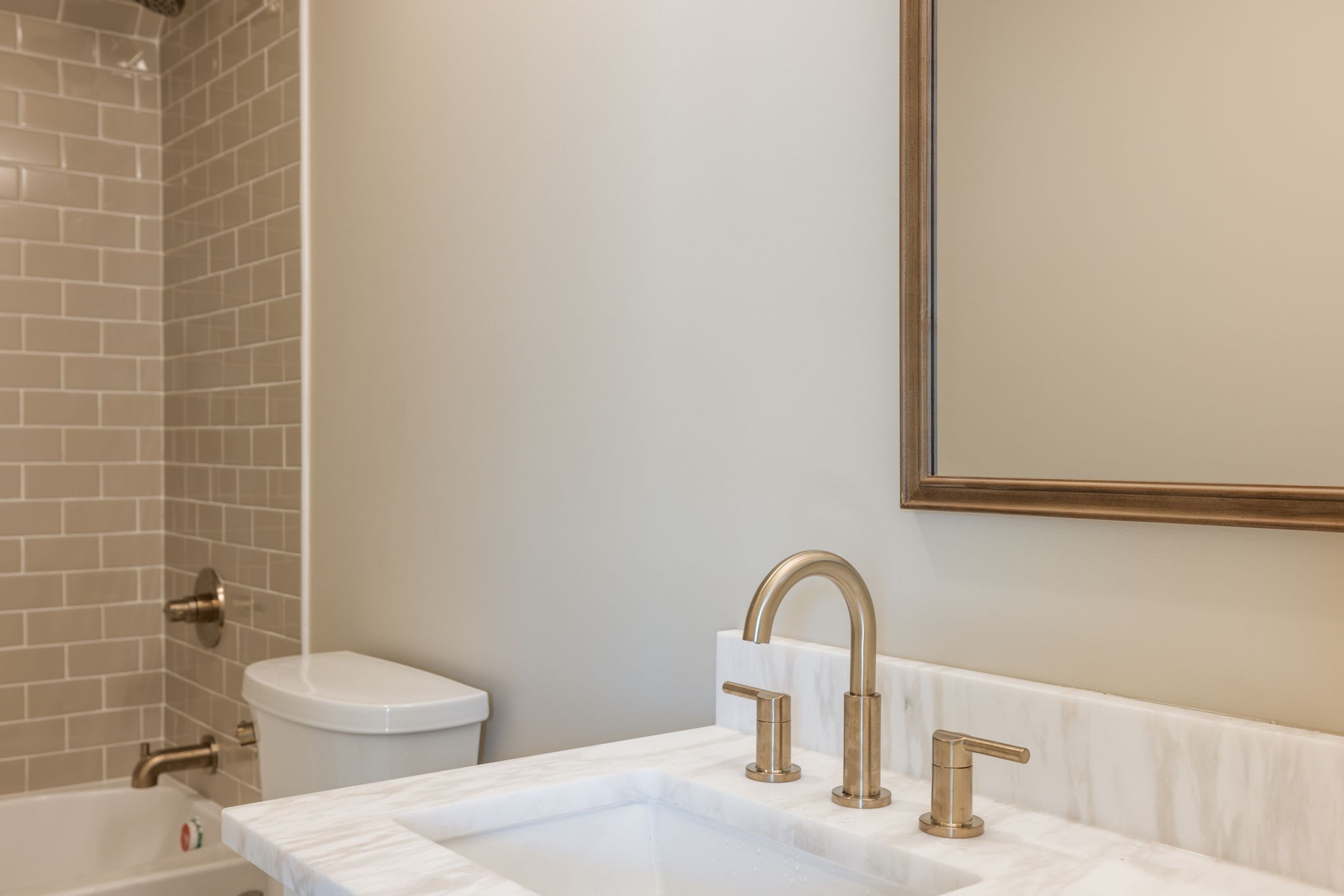 128 Addison Avenue Franklin, TN 37064 - Photo 63 of 81 a bathroom with a sink a toilet and a mirror