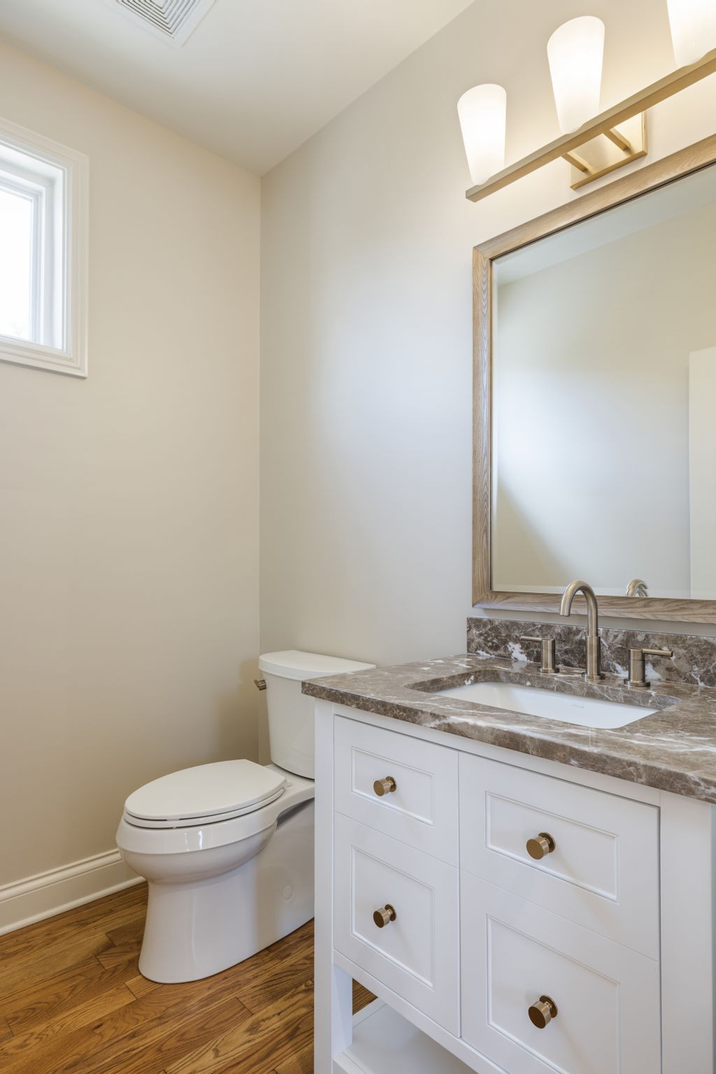 128 Addison Avenue Franklin, TN 37064 - Photo 66 of 81 a bathroom with a granite countertop toilet sink and mirror
