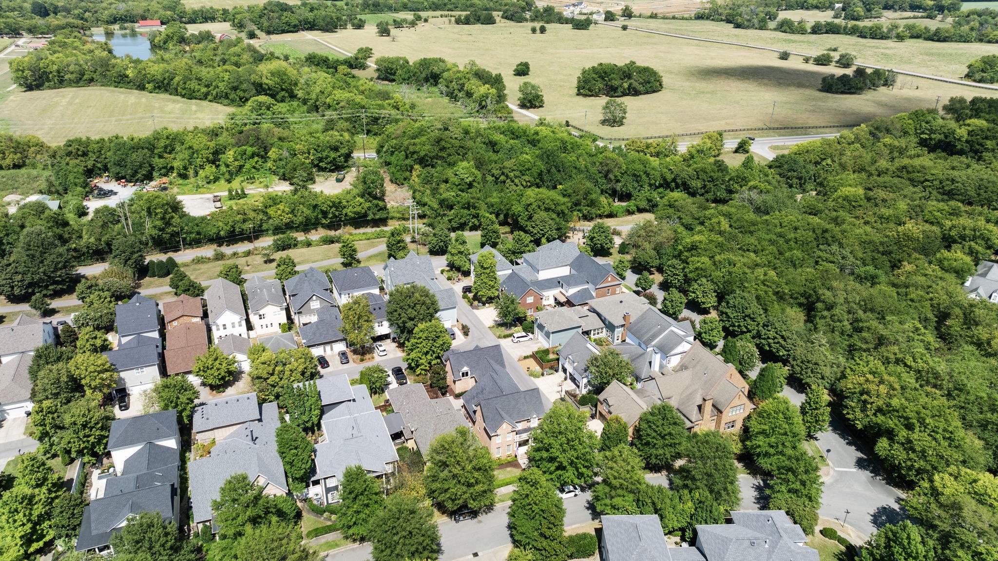 128 Addison Avenue Franklin, TN 37064 - Photo 78 of 81 an aerial view of residential houses with outdoor space and trees all around