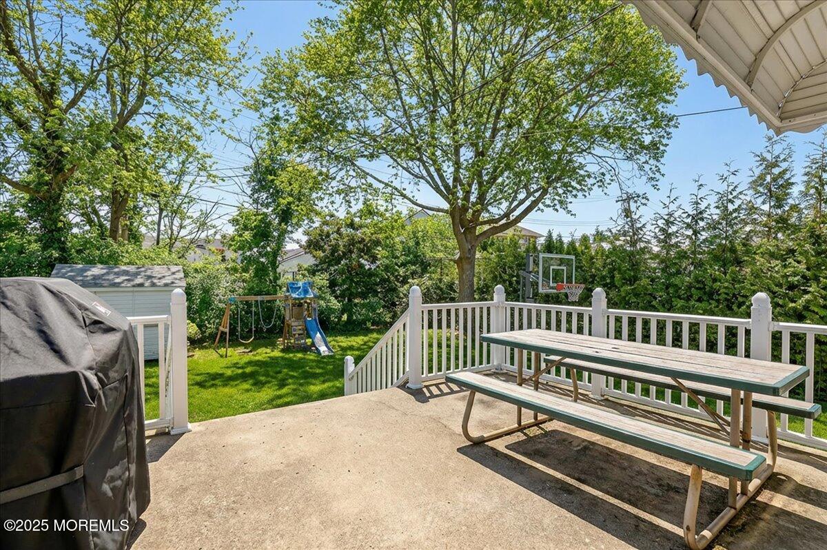57 Hathaway Avenue Deal, NJ 07723 - Photo 11 of 37 a view of a park with a deck and a garden