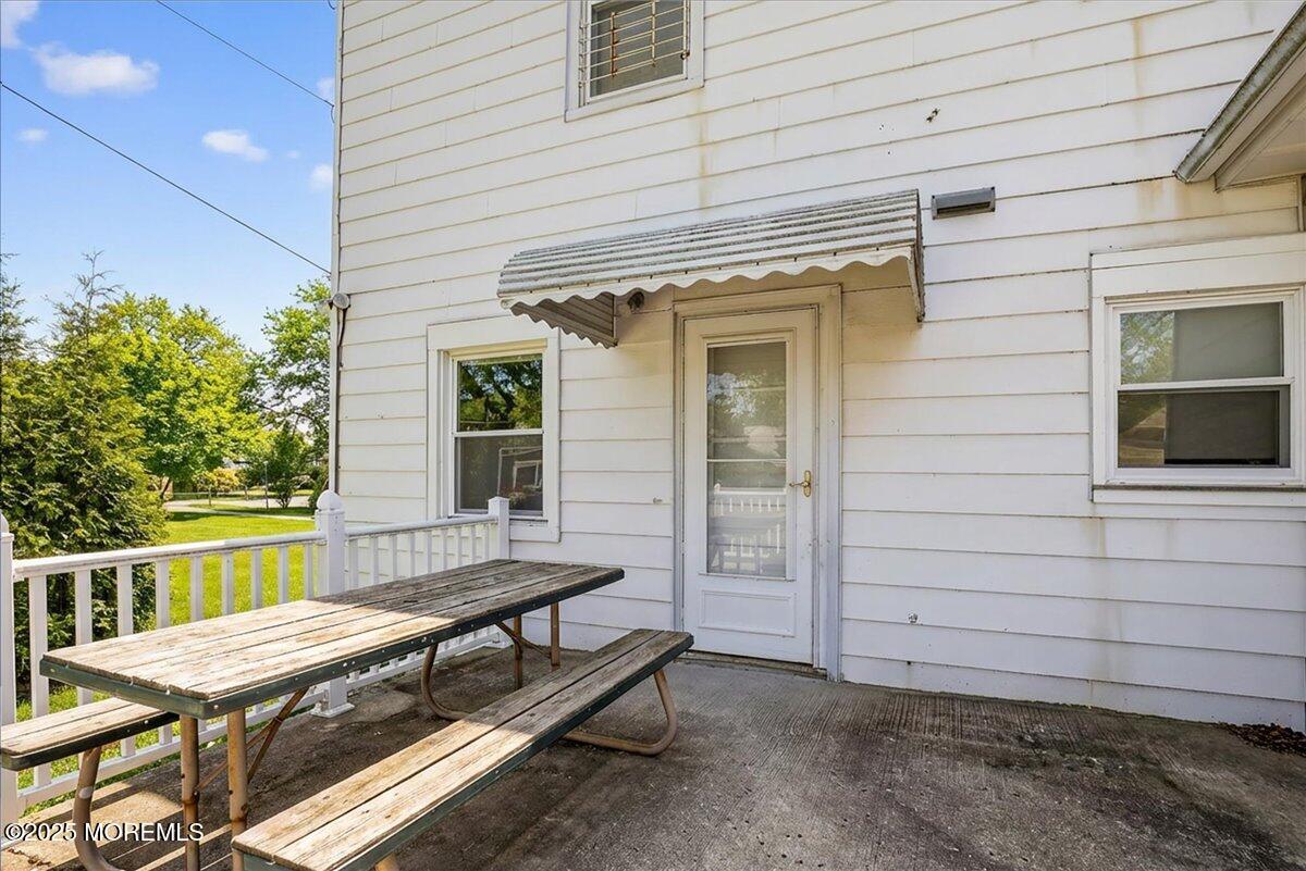 57 Hathaway Avenue Deal, NJ 07723 - Photo 12 of 37 a view of backyard with deck and outdoor seating