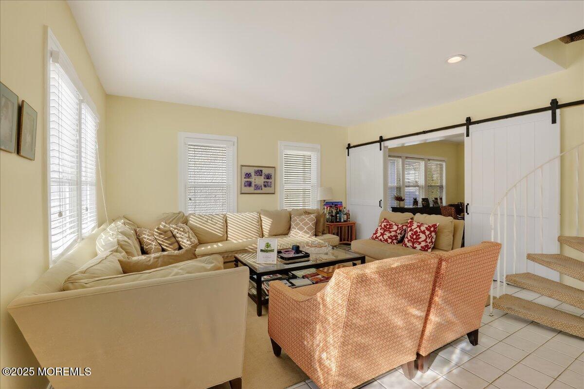 57 Hathaway Avenue Deal, NJ 07723 - Photo 15 of 37 a living room with furniture and a window