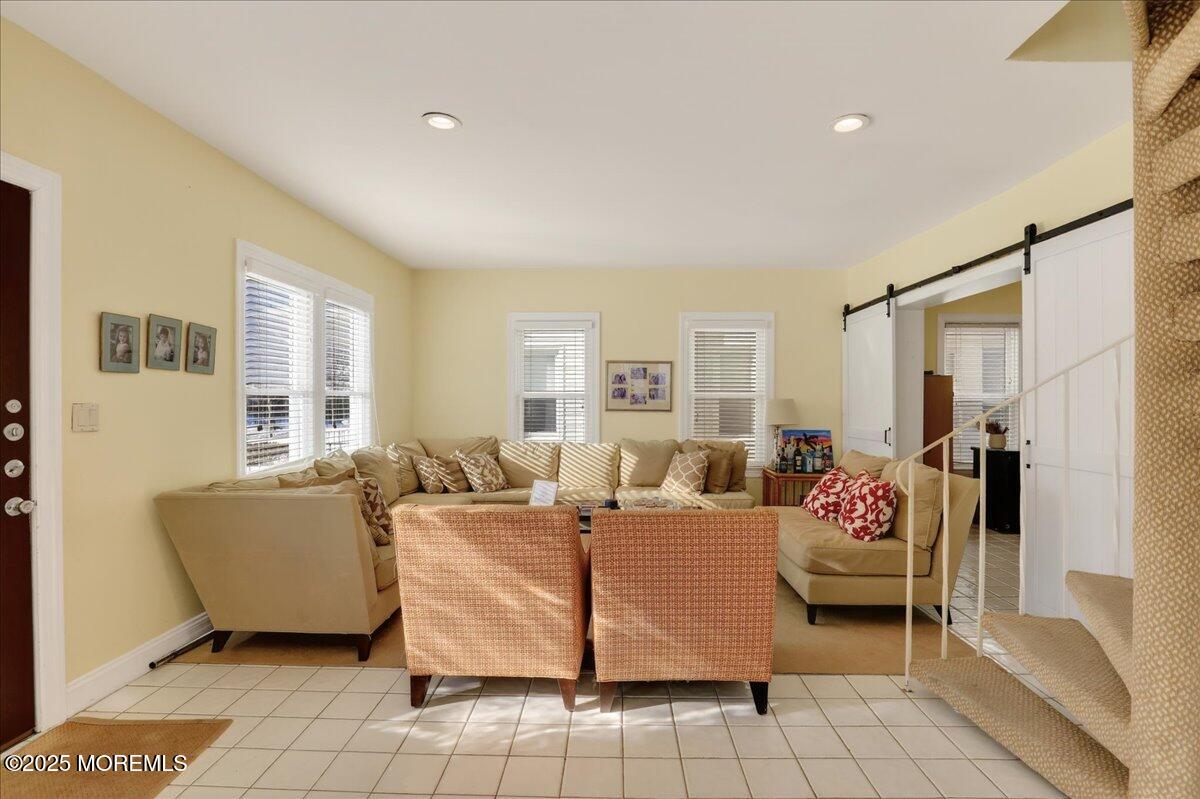 57 Hathaway Avenue Deal, NJ 07723 - Photo 16 of 37 a living room with furniture and a large window