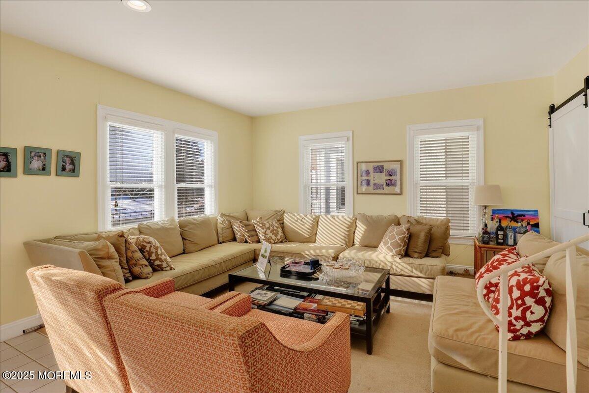 57 Hathaway Avenue Deal, NJ 07723 - Photo 17 of 37 a living room with furniture and a large window