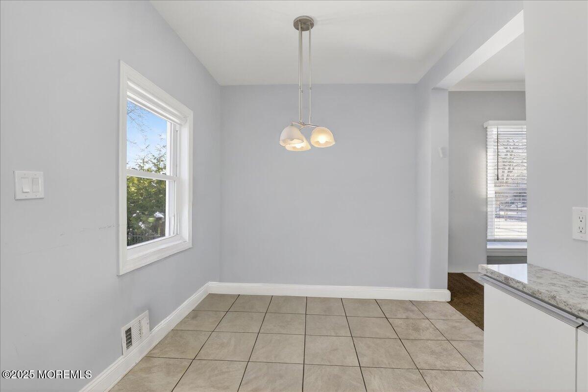 57 Hathaway Avenue Deal, NJ 07723 - Photo 22 of 37 a view of an empty room with a window