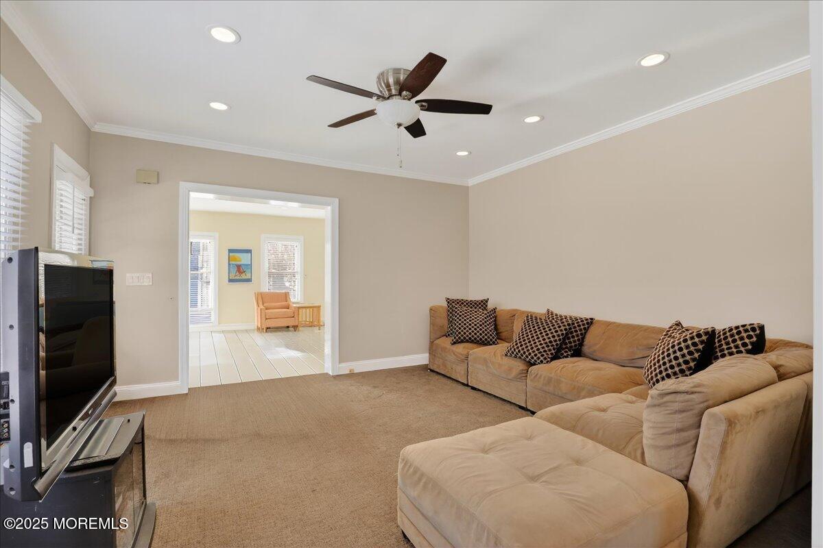 57 Hathaway Avenue Deal, NJ 07723 - Photo 27 of 37 a living room with furniture and a flat screen tv