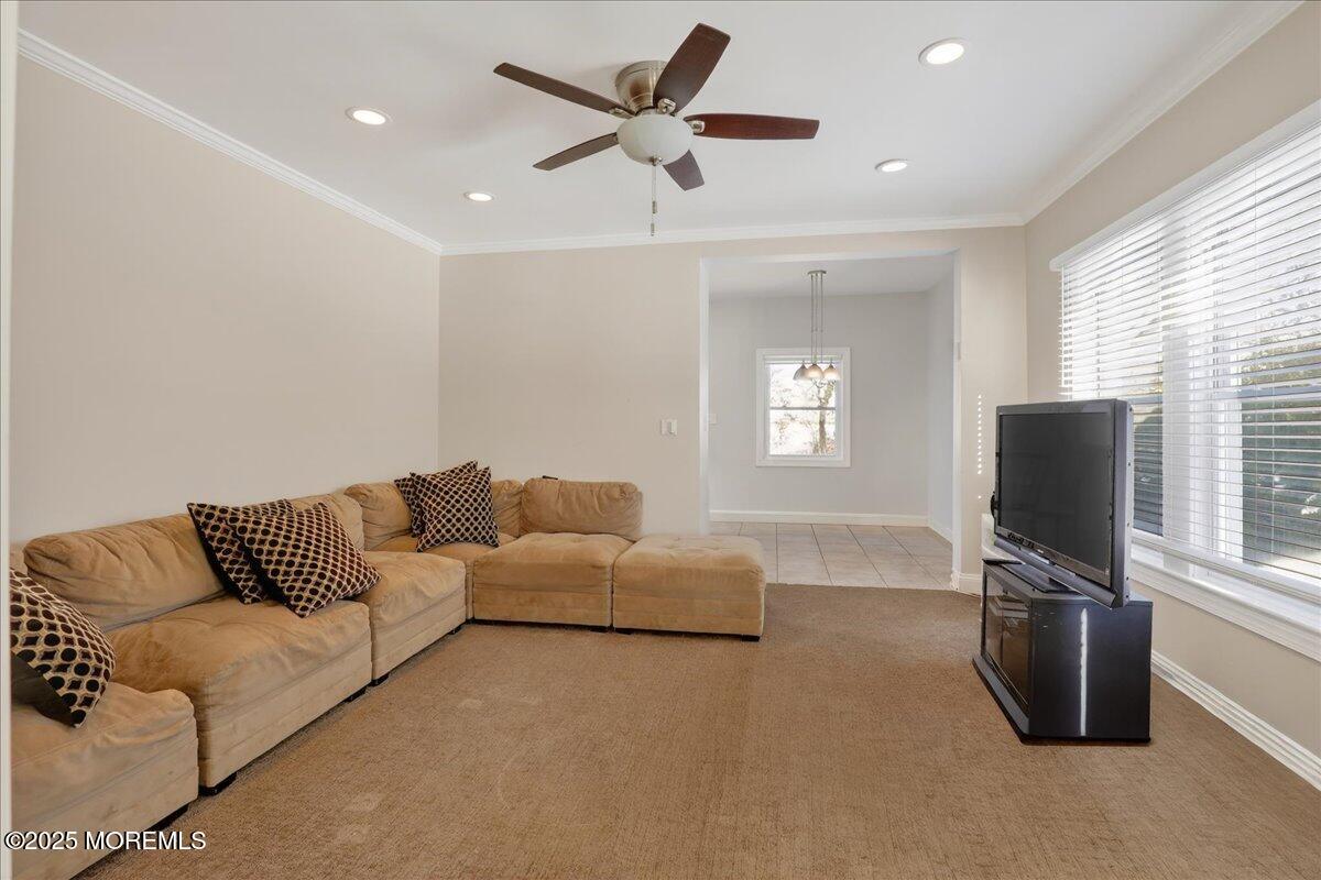 57 Hathaway Avenue Deal, NJ 07723 - Photo 28 of 37 a living room with furniture and a flat screen tv