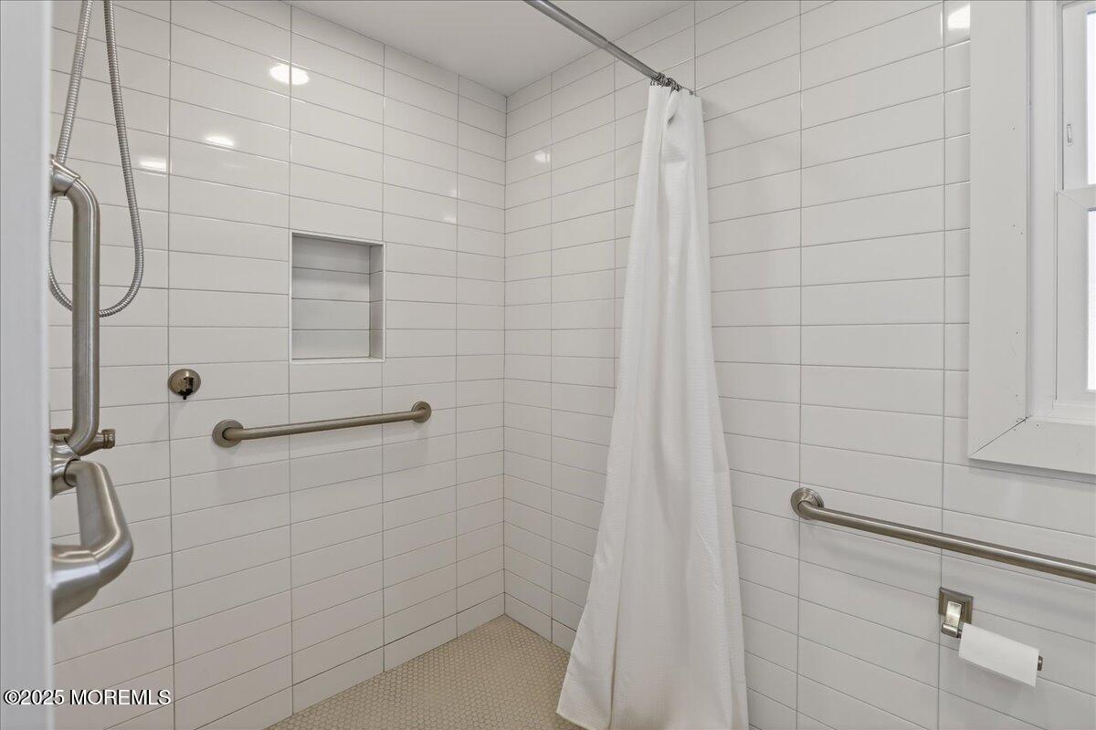 57 Hathaway Avenue Deal, NJ 07723 - Photo 31 of 37 a bathroom with a shower