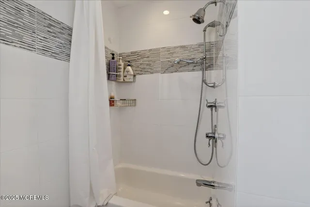 a view of backyard with deck and outdoor seating