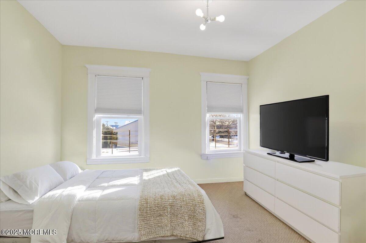 57 Hathaway Avenue Deal, NJ 07723 - Photo 37 of 37 a bedroom with bed tv and window
