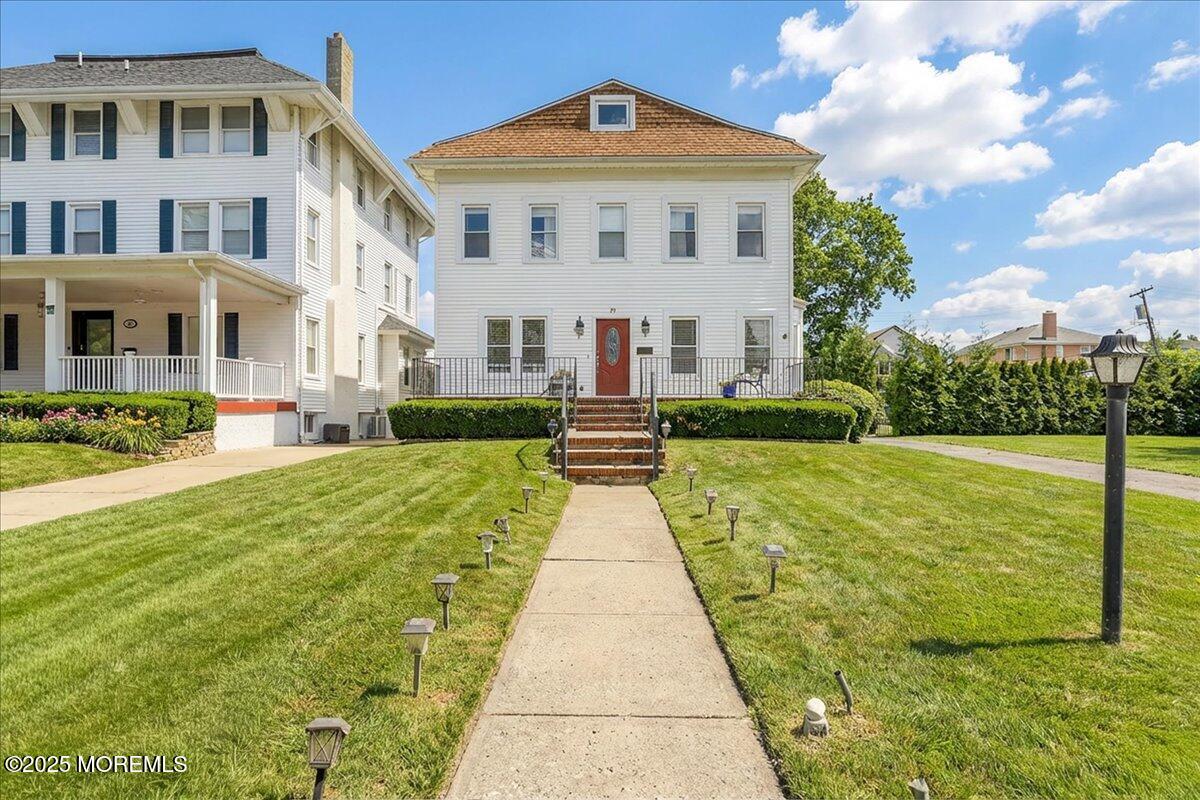 57 Hathaway Avenue Deal, NJ 07723 - Photo 4 of 37 a front view of a building with garden