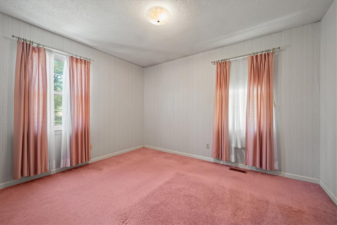 304 Shaw Road Honea Path, SC 29654 - Photo 21 of 39 This bright room features abundant natural light, creating a serene and inviting atmosphere.