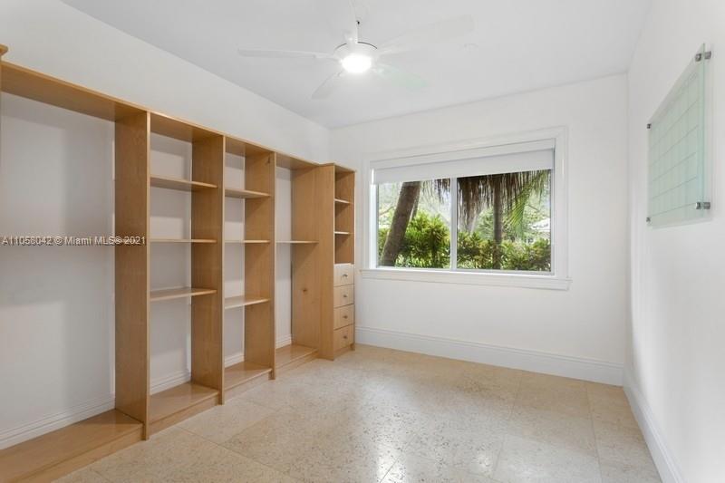 265 Glenridge Road Key Biscayne, FL 33149 - Photo 15 of 23 a view of an empty room with a window