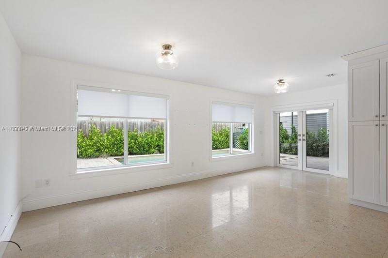 265 Glenridge Road Key Biscayne, FL 33149 - Photo 10 of 23 an empty room with windows and closet