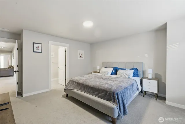 a bedroom with a bed and closet