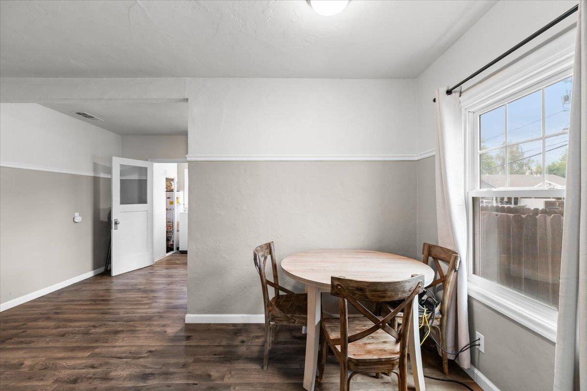 505 South Acacia Avenue Ripon, CA 95366 - Photo 13 of 38 a view of a dining room with furniture and window