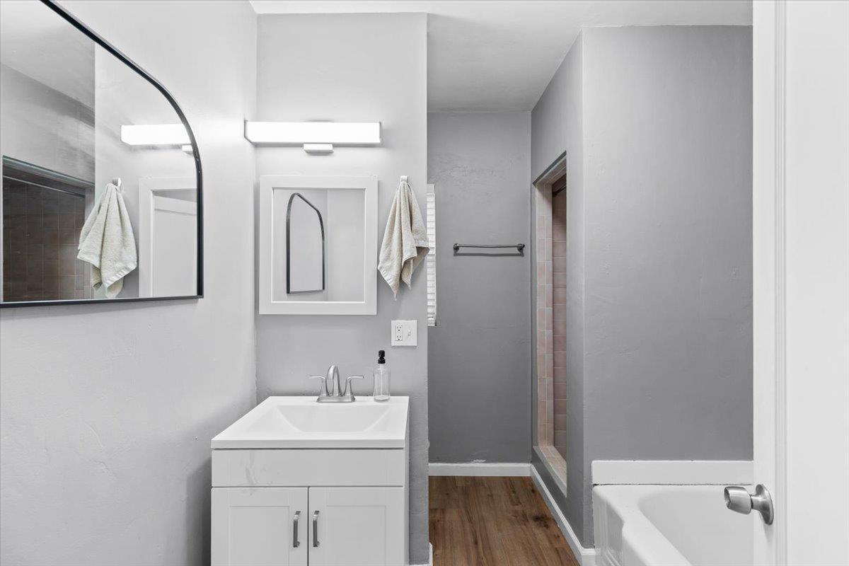 505 South Acacia Avenue Ripon, CA 95366 - Photo 25 of 38 a bathroom with a sink and a mirror