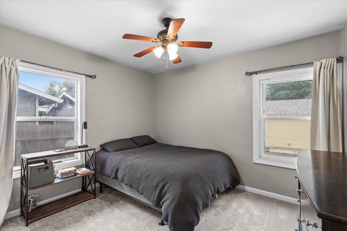 505 South Acacia Avenue Ripon, CA 95366 - Photo 27 of 38 a bedroom with a bed and a window