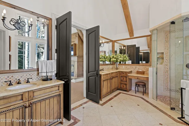 a bathroom with a sink a washer and dryer