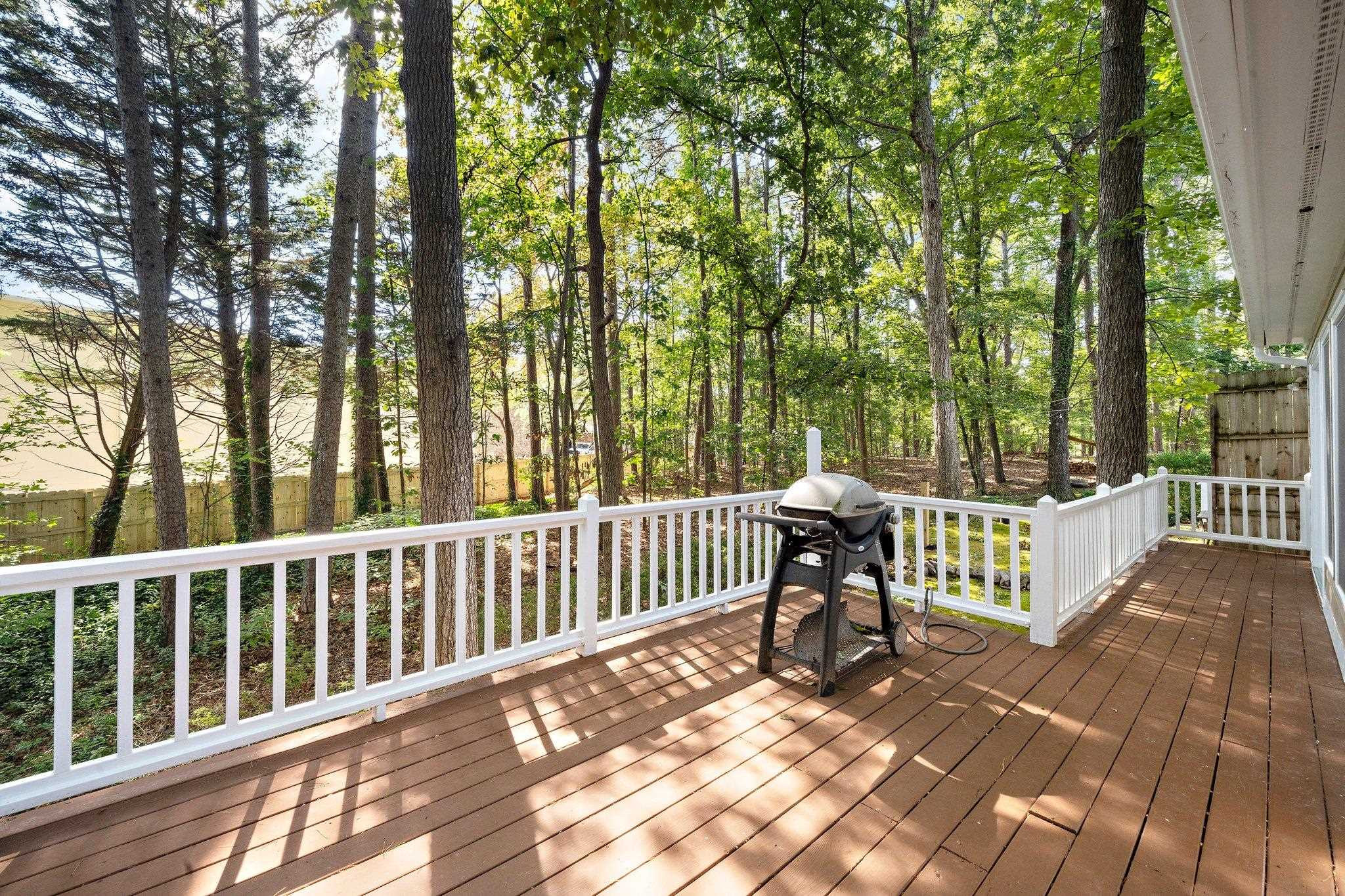 902 Bridge Way Raleigh, NC 27615 - Photo 20 of 27 a view of a bench in the backyard