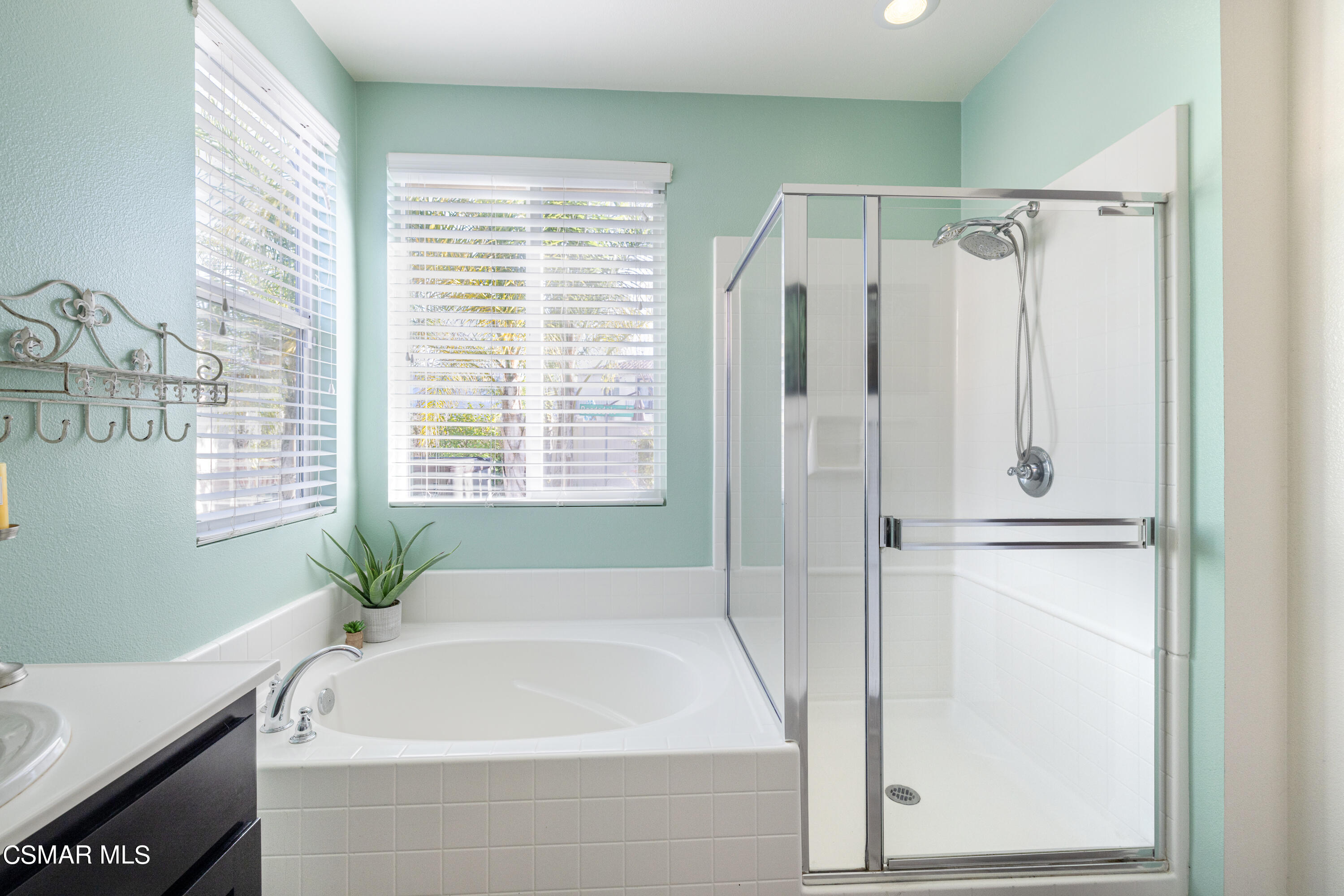 396 Edgewood Drive Fillmore, CA 93015 - Photo 13 of 29 a bathroom with a bathtub and a shower